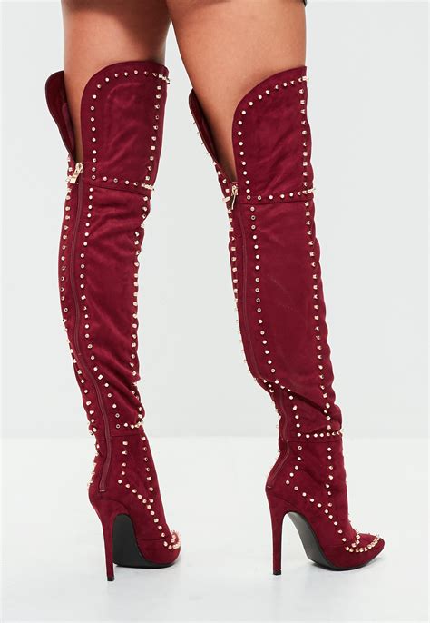 designer thigh high boots
